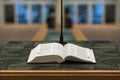 Open Bible on Preacher`s Pulpit Before Empty Church Pews Royalty Free Stock Photo