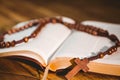 Open bible with rosary beads Royalty Free Stock Photo