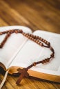 Open bible with rosary beads Royalty Free Stock Photo