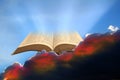 Open bible sky clouds holy book god jesus christian christianity Royalty Free Stock Photo