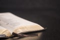 Open Bible on a Slate Tabletop Royalty Free Stock Photo