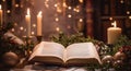 Open Bible on a Table in a Christmas Scene with Decorations and Holly