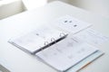 Open binder with blank paper sheets on white desk office supply for organized documents and information management Royalty Free Stock Photo