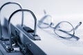 Open binder and glasses Royalty Free Stock Photo
