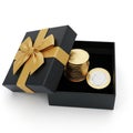 Open Black Gift Box with Gold Ribbon and Stack of Gold Coins on White Background present Royalty Free Stock Photo
