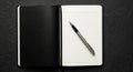 Open Black Leather Notebook with Pen on Dark Textured Surface journal diary Royalty Free Stock Photo