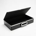 Open Black Rectangular Box with Silver Trim and Handle on White Background container case Royalty Free Stock Photo