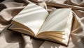 Open Blank Book on Textured Fabric Royalty Free Stock Photo