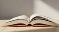 Open Blank Book on Wooden Table with Soft Sunlight Royalty Free Stock Photo