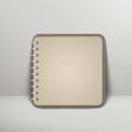 Open blank brown notebook over grey Royalty Free Stock Photo