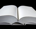 Open blank dictionary, book on black background Royalty Free Stock Photo