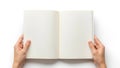 Open blank notebook held by hands, isolated on white background Royalty Free Stock Photo