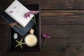 Open blank notebook, lit candle, flower Royalty Free Stock Photo