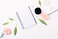 Open blank notepad among floral flat layout