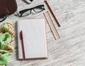 Open a blank Notepad, pen, glasses, phone, handbag and scarf Royalty Free Stock Photo