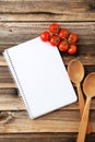 Open blank recipe book on brown wooden background Royalty Free Stock Photo