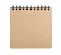 Open blank square notebook from brown craft paper with a spiral lies on a white background