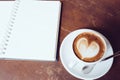 Open a blank white notebook and cup of coffee Royalty Free Stock Photo