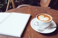 Open a blank white notebook and cup of coffee Royalty Free Stock Photo