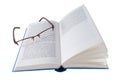 Open blue book with glasses Royalty Free Stock Photo