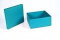 Open blue box to store gift and utensils isolated on white background Royalty Free Stock Photo