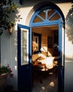 Open blue door heading to the interiors of a modern house. Royalty Free Stock Photo