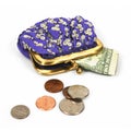 Open blue purse with golden sequins and money Royalty Free Stock Photo