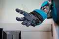 Open blue robot hand closeup Royalty Free Stock Photo