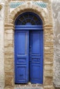 Open blue shabby door Royalty Free Stock Photo