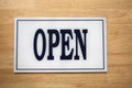 Close up shot of open sign on wooden background Royalty Free Stock Photo