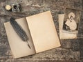 Open book, antique writing tools and vintage easter postcard Royalty Free Stock Photo