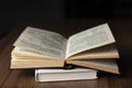 Open book. Open Bible. On a wooden table. Reading.