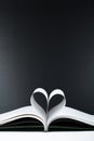 Open book with blue and yellow heart shaped pages. The concept of education in Ukraine Royalty Free Stock Photo