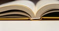 Open book close up. One book is yellow. Royalty Free Stock Photo