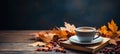 Open book and coffee on a cozy table fall still life with copy space, autumn relaxing reading moment