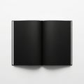 An open book with completely blank black pages lies on a white surface, presented from a top-down perspective isolated on white Royalty Free Stock Photo