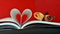 Open book with curved pages in a heart shape