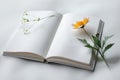 Open Book with Delicate Flowers on White Background