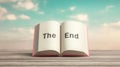 Open book displaying the end message on a final page, symbolizing conclusion, finish, closing a chapter Royalty Free Stock Photo