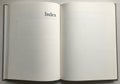 Open book displaying a generic index page. The left page begins with a bold \