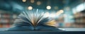 The Open Book Displaying Pages in a Cozy Library Setting.AI generated image Royalty Free Stock Photo
