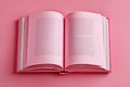 Open book displaying text on pink monochrome background presenting literature and education concept Royalty Free Stock Photo
