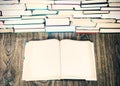 Open book with empty page and stack of old book education concept background, with copy space for text Royalty Free Stock Photo