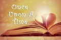 Book of fairy tales and text Once upon a time Royalty Free Stock Photo