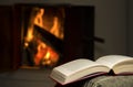 Open book by fireplace.