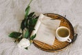 Open book with glasses, cup coffee and bouquet white pink peonies flowers Royalty Free Stock Photo