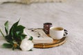 Open book with glasses, cup coffee and bouquet white pink peonies flowers Royalty Free Stock Photo