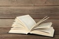 Open book on grey wooden background. Space for text Royalty Free Stock Photo