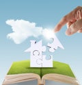 Open book of hand complete puzzle home Royalty Free Stock Photo