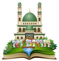 Open book with happy islamic kids and colorful text Eid Mubarak in front of a mosque